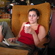 Davis relaxes at a coffee shop while Tibetans suffer under the rule of the Chinese.